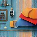 Icon representing textile design with color swatches and tools